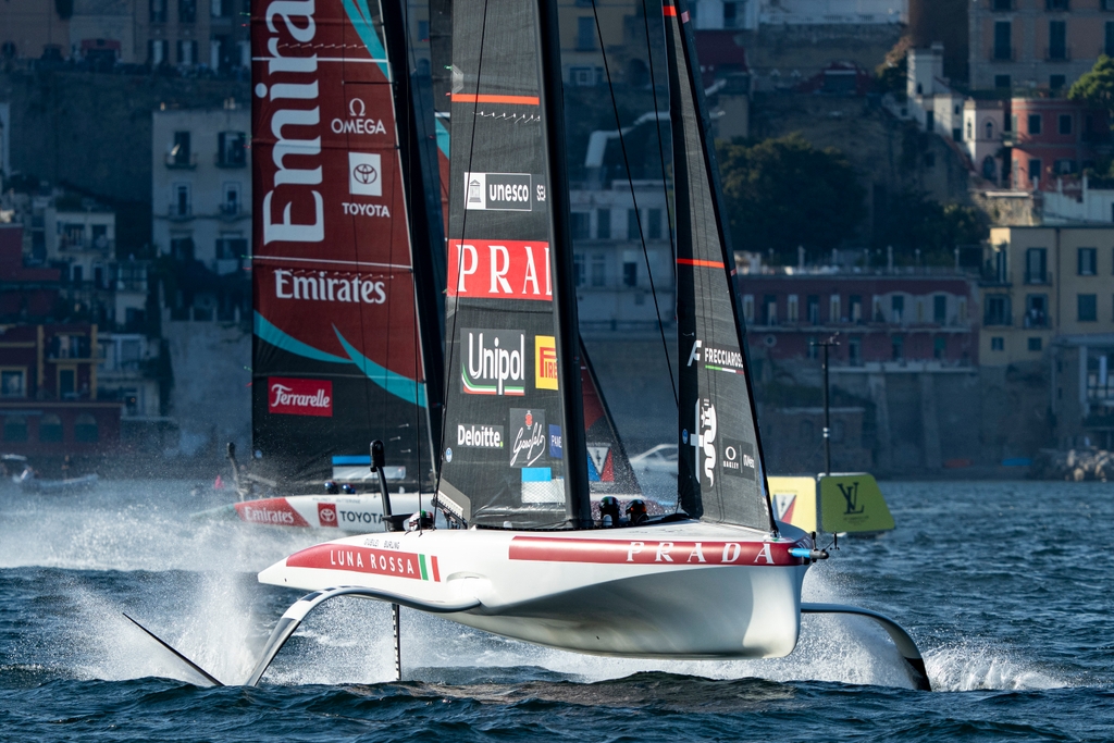 Luna Rossa AC40 foiling in the Gulf of Naples during preliminary racing